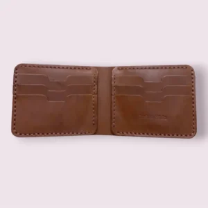 Interior view of The Bison brown handmade leather bifold wallet featuring 6 precision-cut T-slots and the Indus Hide logo on full-grain leather by Indus Hide